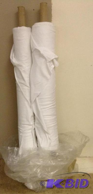 Two bolts of polo type fabric.