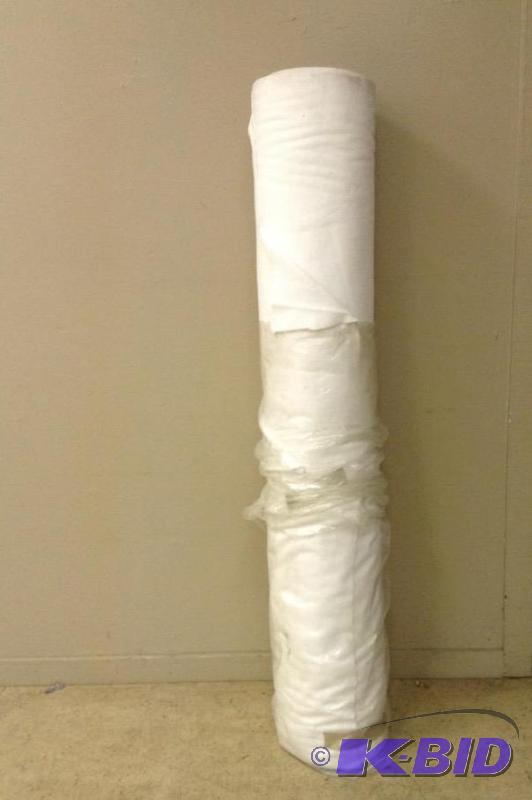 Bolt of white upholstery type fabric