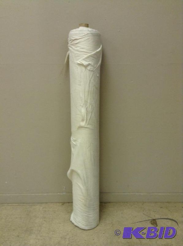 Bolt of cream color flannel like fabric