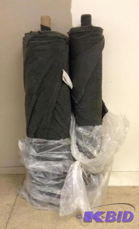 Two bolts of greenish gray fleece type fabric