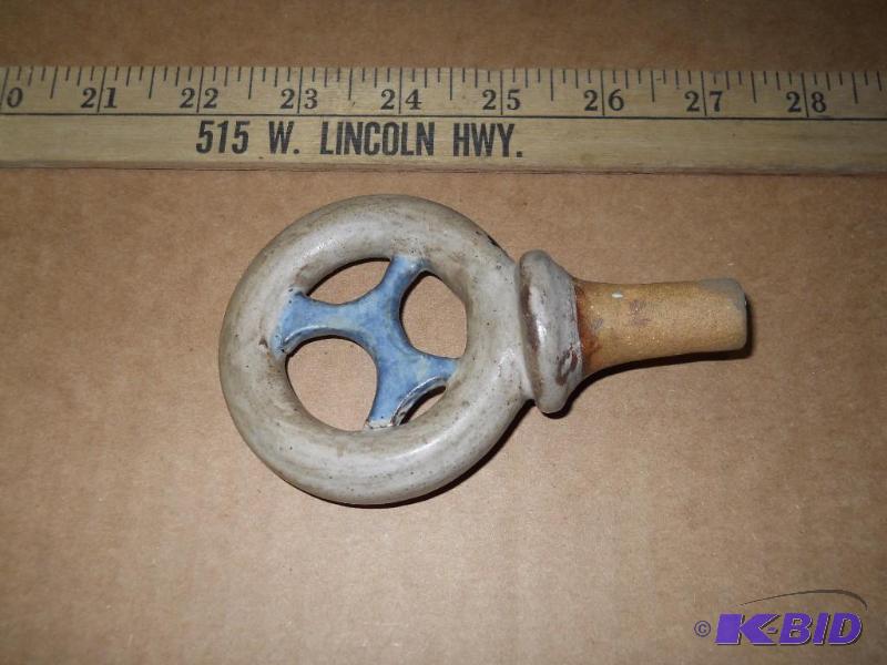 lot 36 image: Wine Bottle Stopper. Clay.