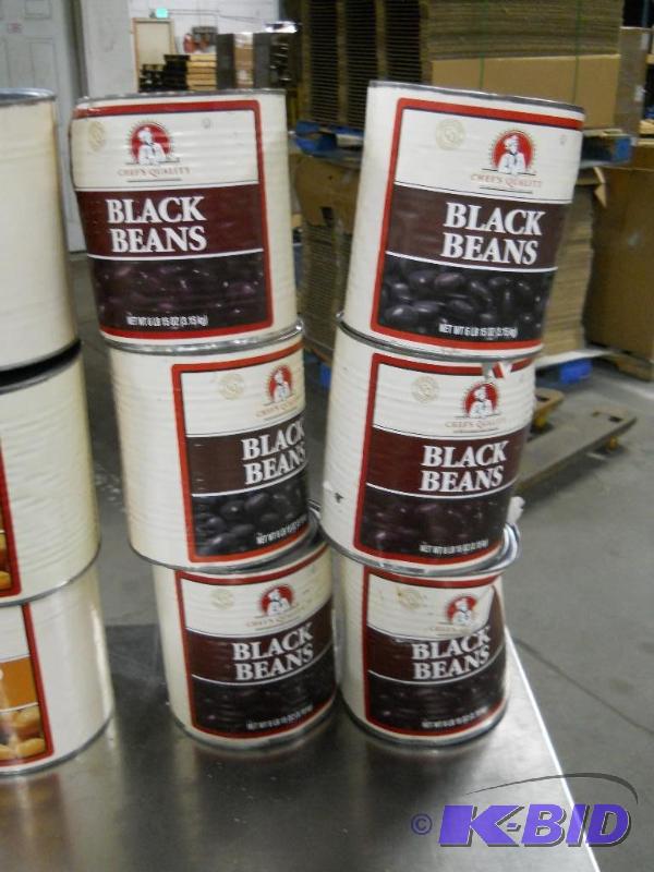 lot 97 image: 6 #10 Cans of Black Beans. NEW but Dented.