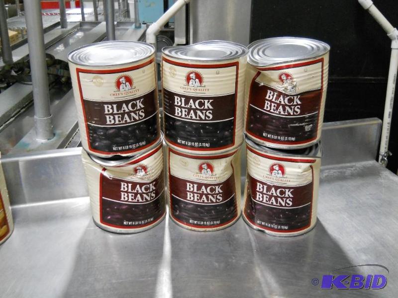 lot 98 image: 6 #10 Cans of Black Beans. NEW but Dented.