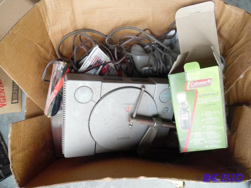 Box of misc. -Playstation -Tools -Game chips...