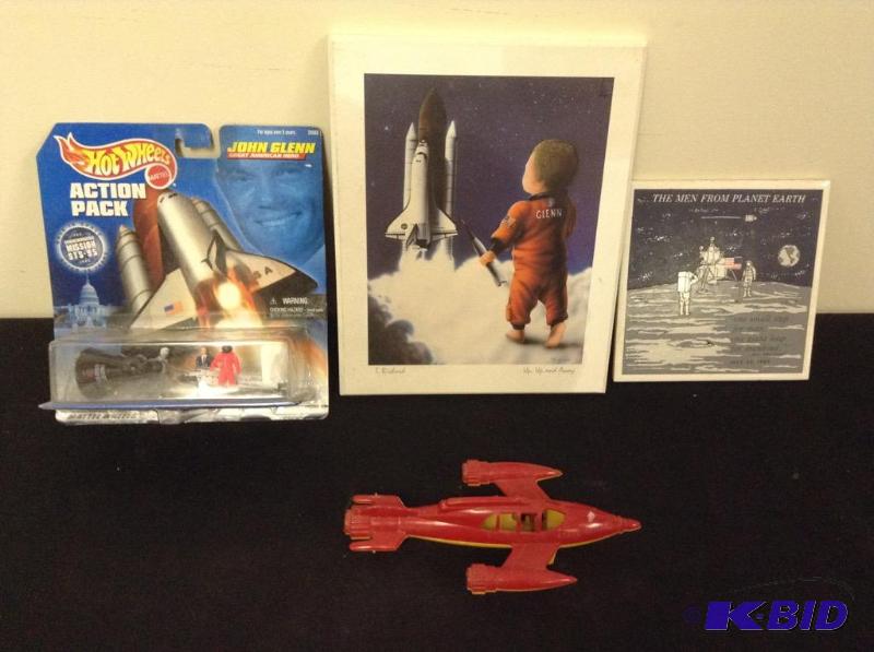 lot 18 image: Astronaut John Glenn Space Items and Rocket
