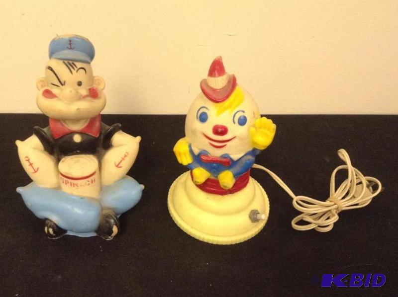 lot 27 image: Humpty Dumpty Night Light and Rubber Popeye the Sailor Man Rubber Figure