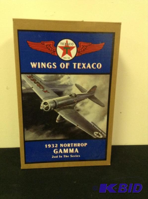 lot 30 image: Wings of Texaco 1932 Northrop Gamma Die Cast Bank