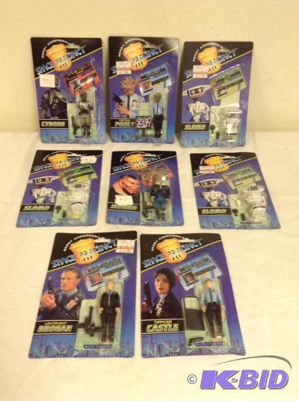lot 34 image: Lot of Eight Space Precinct Action Figures