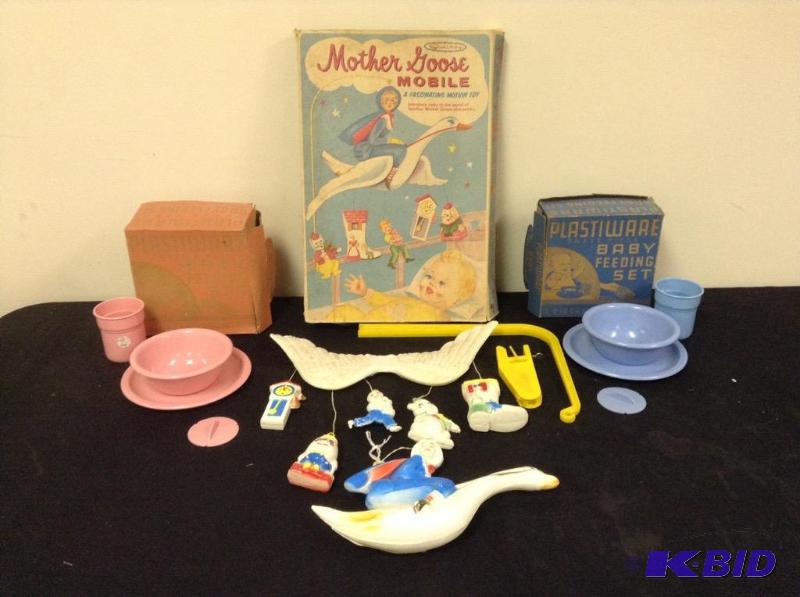 lot 71 image: Fond Memories Baby Care Items and Mother Goose Mobile