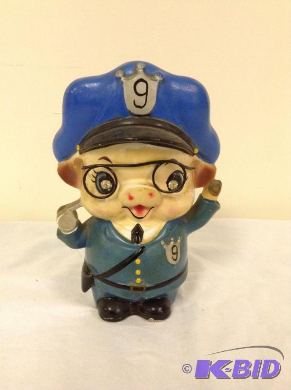 lot 77 image: Adorable Ucago Ceramic Cop Pig Bank with Rhinestone Eyes