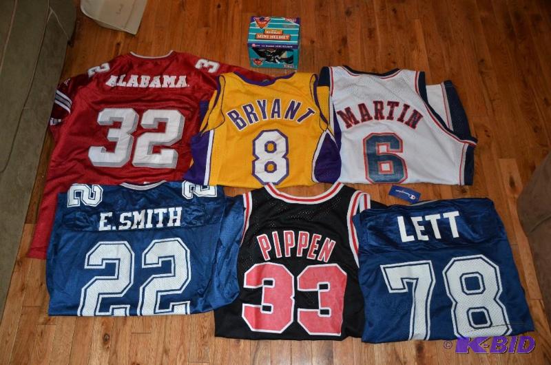 Collection of football and basketball items, ...