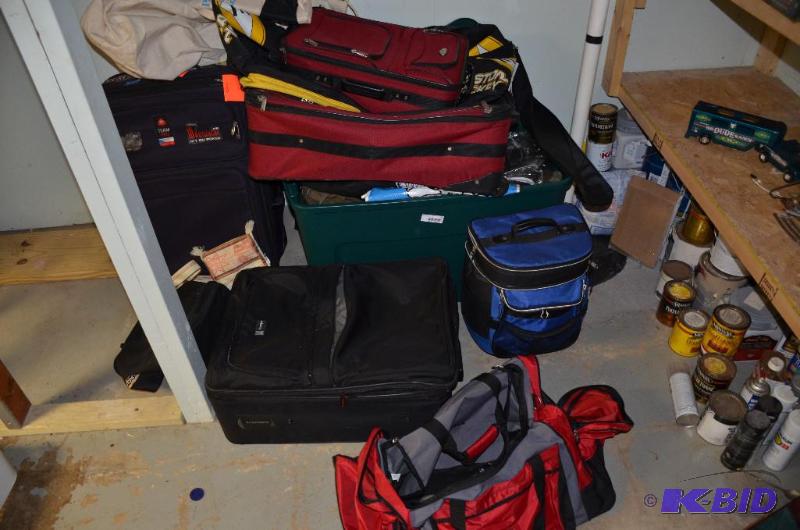 large group of luggage and nice duffell bags...