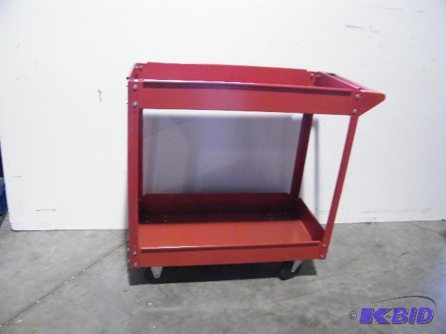 lot 65 image: Two Tier Red Cart - Has two levels for storag...