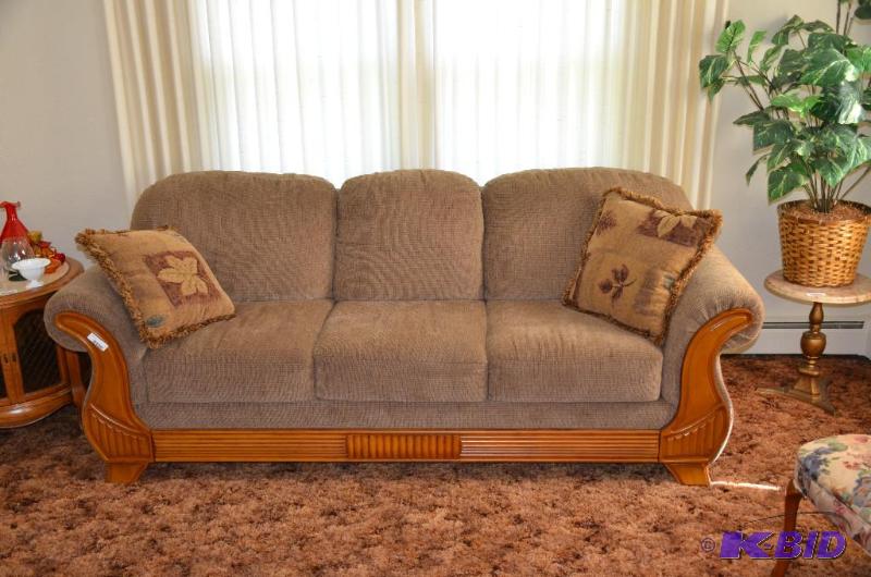 lot 1 image: Beautiful sofa 86" long with carved wood...