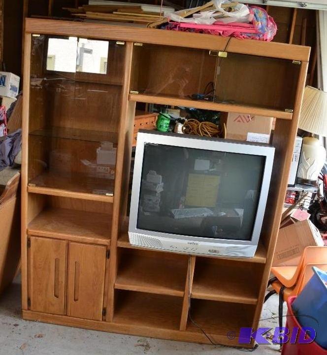lot 126 image: Entertainment center with Insignia TV...