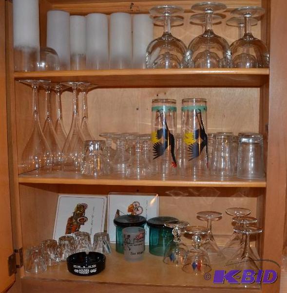 lot 156 image: 3 shelves of wine and beer glasses, and plast...