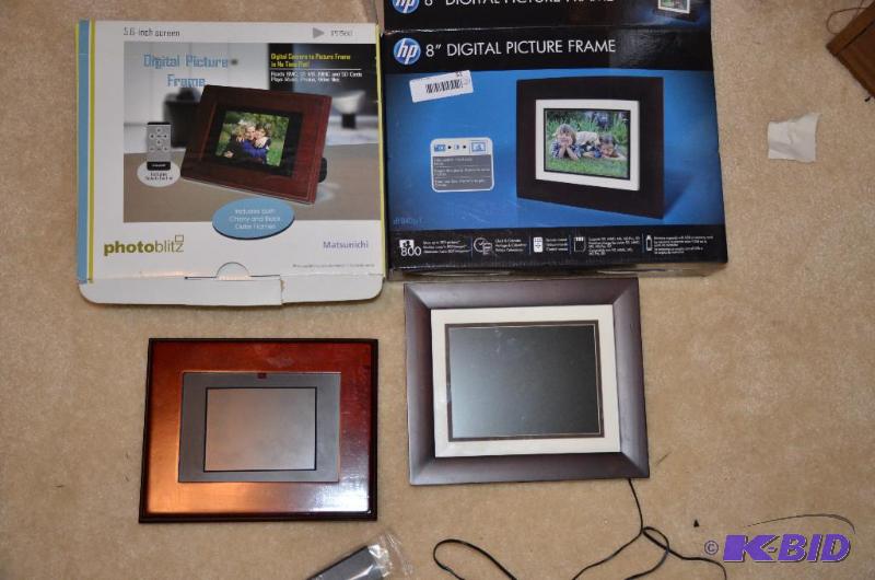 lot 51 image: 2 digital picture frames 1 is 8" and th...