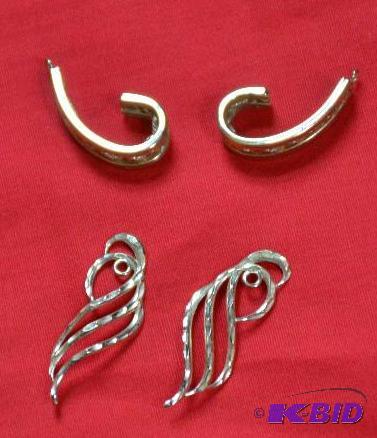 lot 60 image: 2 sets of Omrmo elegant earrings...