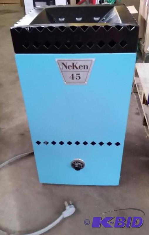 lot 22 image: NeKen 45 Sauna Heater.  No stones.  Consignor claims it works.  220V