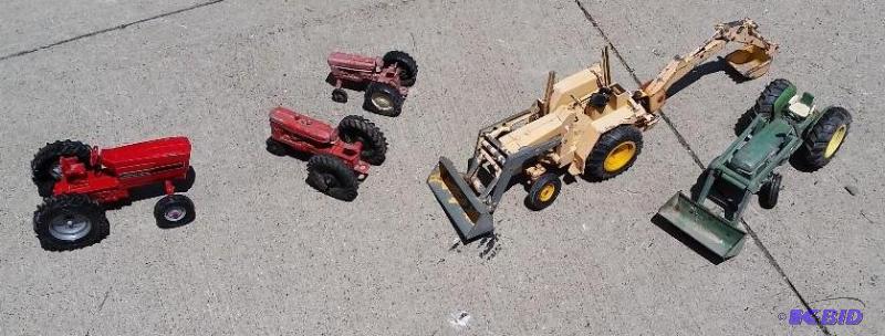 lot 46 image: Collection of old Metal replica toy tractors