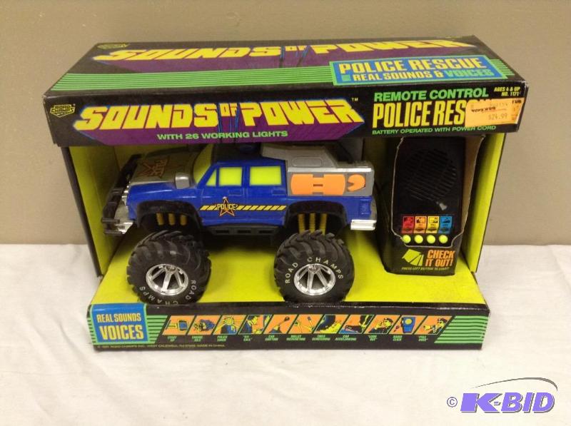 lot 31 image: Sounds of Power Remote Control Police Rescue Vehicle