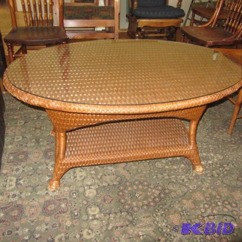 lot 10 image: Oval Wicker Coffee Table