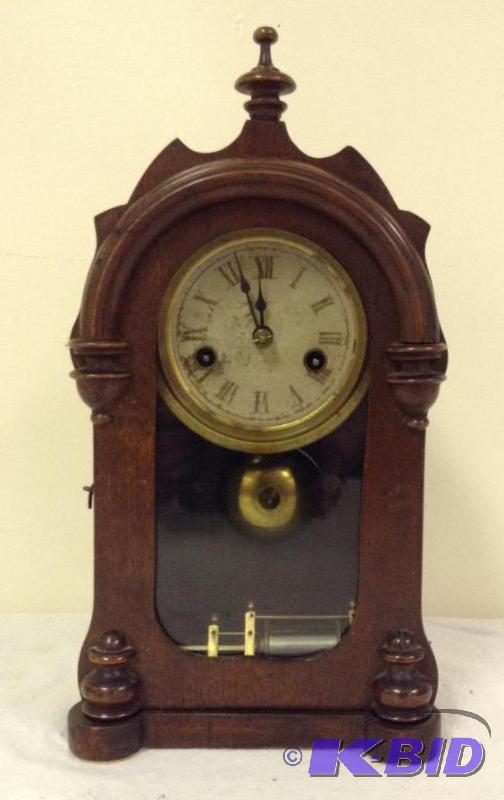 lot 13 image: Small Chiming Mantle Clock Dark Wood Case