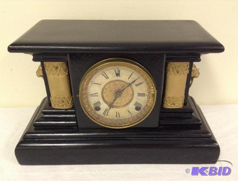 lot 2 image: Wm. L. Gilbert Clock Co. Decorative Mantle Clock with Lion Heads