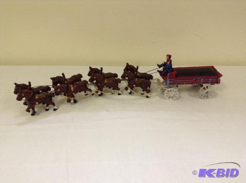 lot 42 image: Painted Cast Iron Horse & Wagon