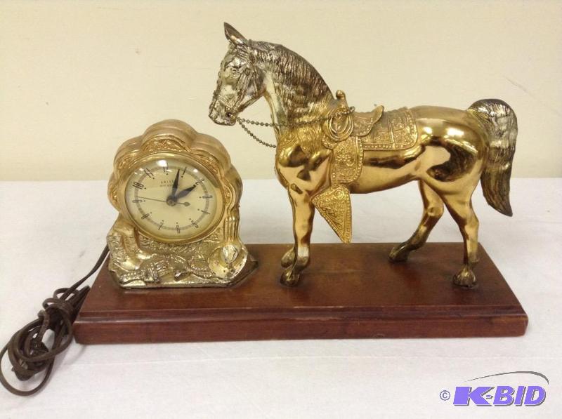 lot 58 image: Vintage United Electric Clock with Horse Display Clock