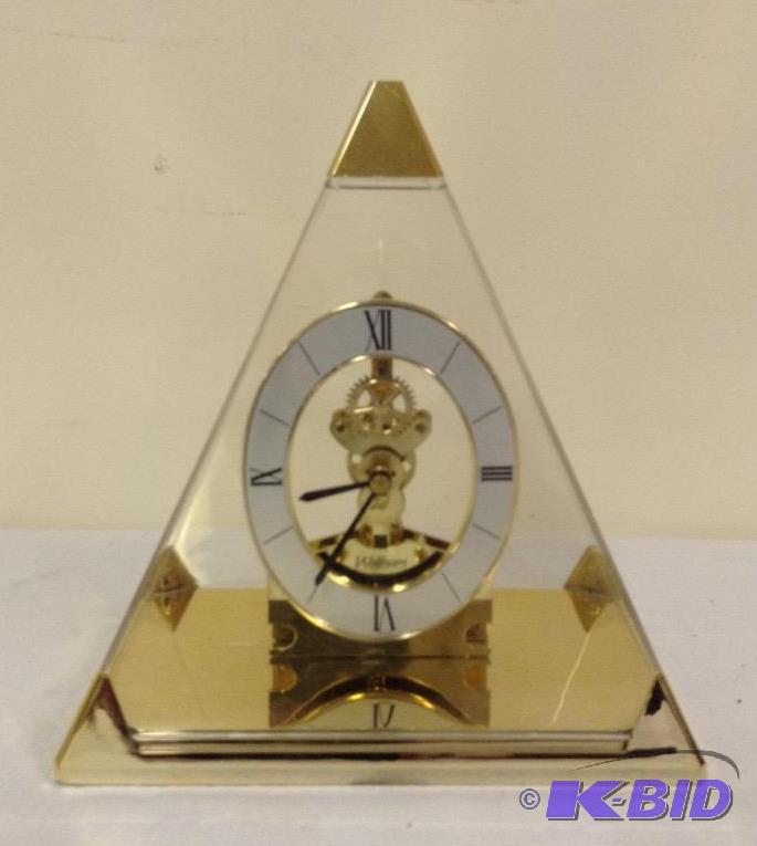 lot 6 image: Waltham Quartz Clear and Gold Pyramid Clock