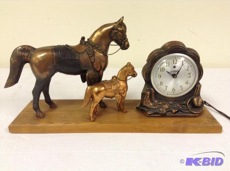 lot 61 image: Vintage Spartus Electric Clock with Horses PartsRepair