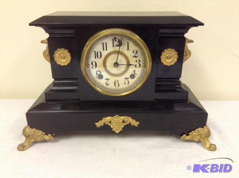 lot 63 image: AntiqueVintage Enameled Metal Clock with Ornate Detailing