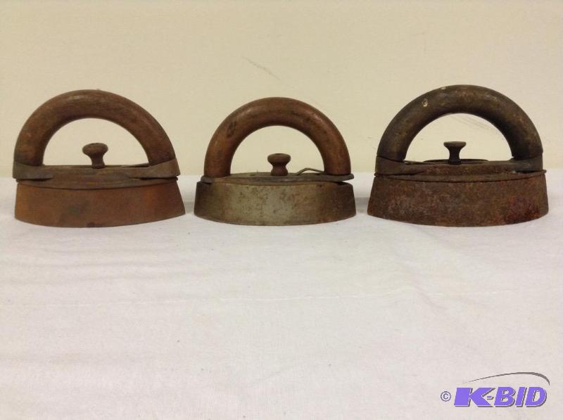 lot 69 image: Lot of Three Wood Handled Sad Irons