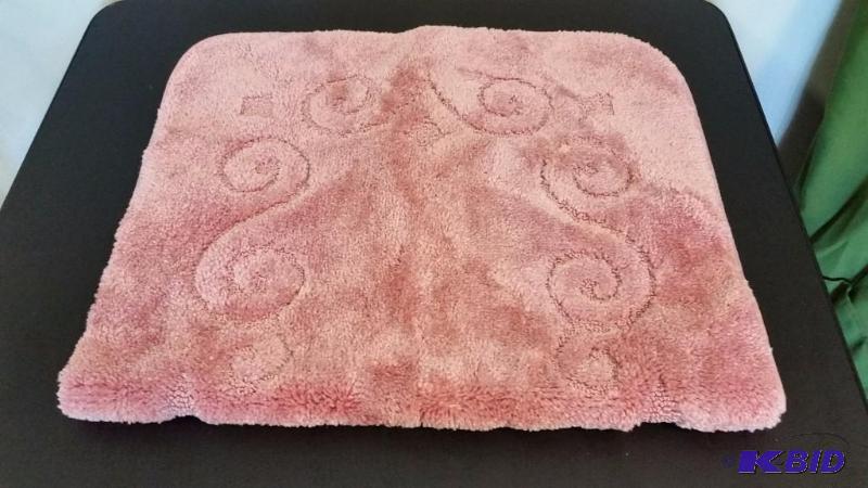 lot 55 image: JCP Home Rose Colored Embossed Pattern Rug.  24 x 40  No Packaging.