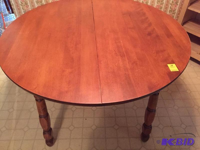 lot 14 image: Round Wooden Dining Table with Three Chairs
