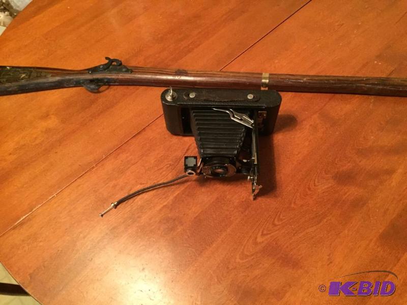 lot 141 image: Brownie Camera and Kids Cap Gun Rifle