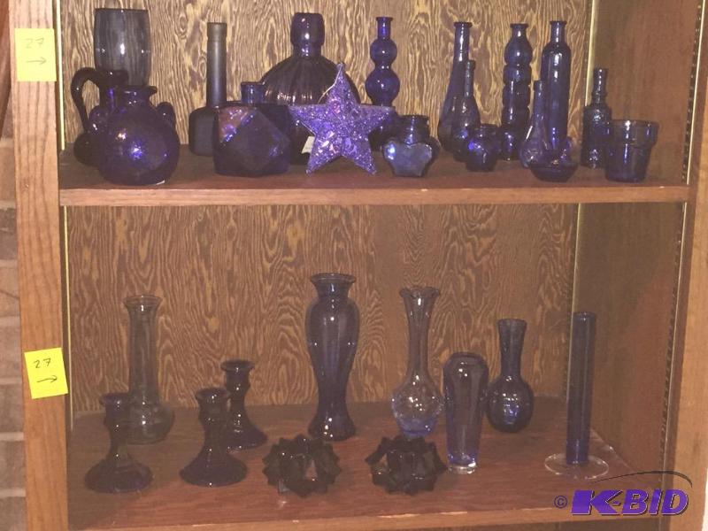 lot 27 image: Two Shelves of Blue Glass Mostly Vases