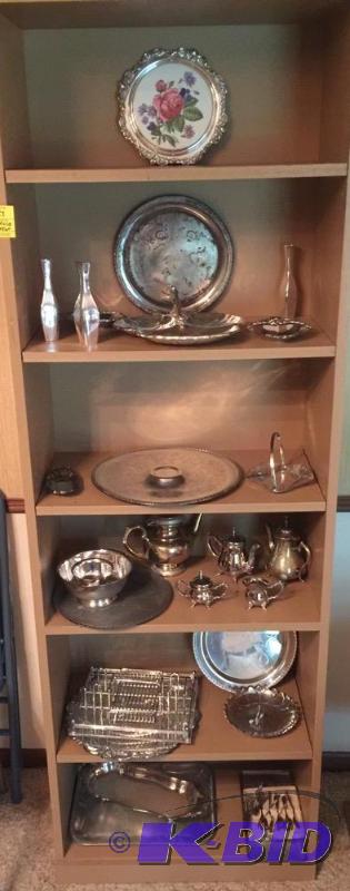 lot 33 image: Entire Bookshelf of Silver Plate and Silver Tone Items