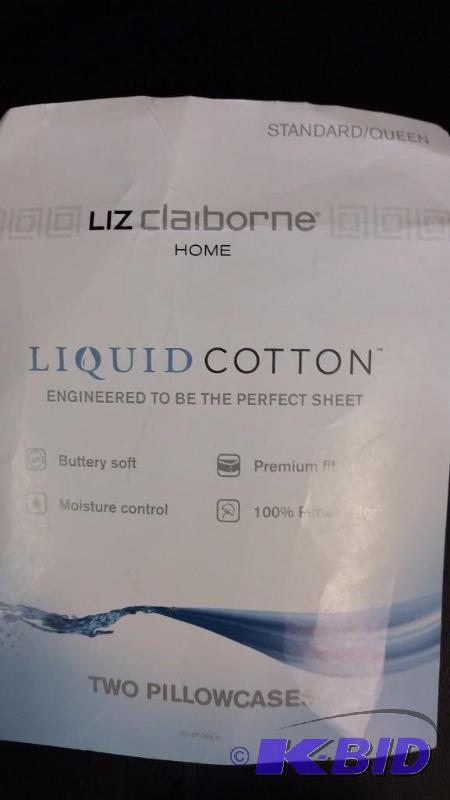 lot 30 image: Liz Claiborne Light Sage Green Standard 2 Pillow cases.  Still in Package.