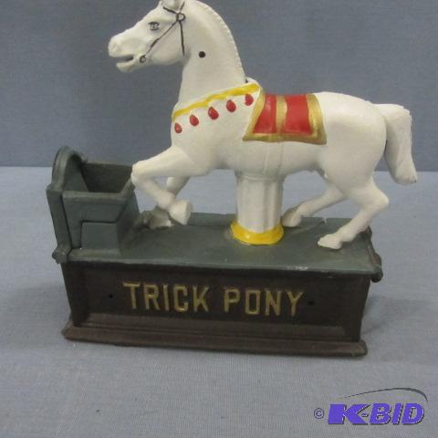 lot 31 image: Trick Pony Cast Iron Bank