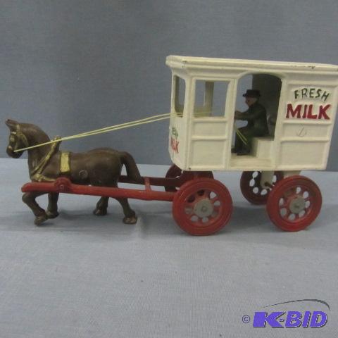 lot 35 image: Milk Wagon Cast Iron Bank