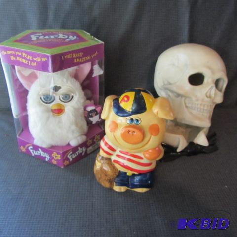 lot 99 image: Furby, Skull, Piggy Bank