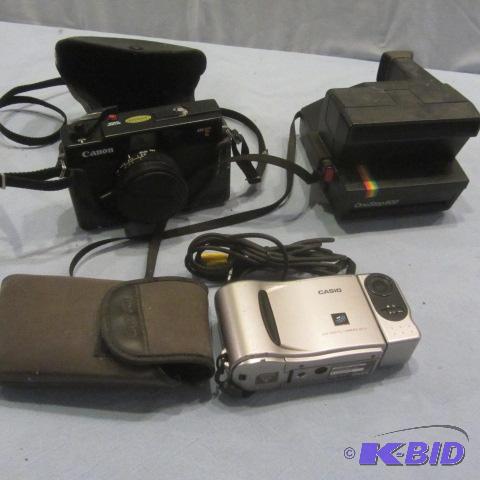 lot 122 image: Vintage Canon, Polaroid, Casio