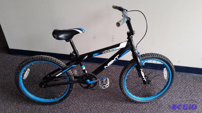 lot 36 image: Boys Next Blue 20 Wheel Dirt Bike.  Could us a good tune up.  See pics.