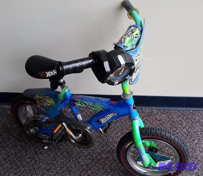 lot 38 image: Boys Hotwheels 12 Bike no Training Wheels.  Could us a good tune up.  See Pics.