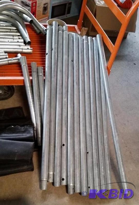 lot 39 image: Large Trampoline.  With Net and pads.  Missing a few minor parts.  They can be ordered.  Was never used.