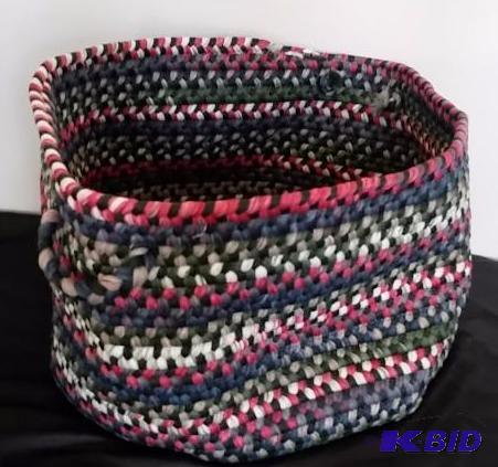 Over sized Laundry Carry bag.  Made like a rag rug.  Beautiful item