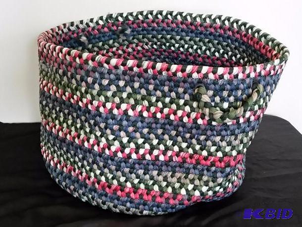 Over sized Laundry Carry bag.  Made like a rag rug.  Beautiful item