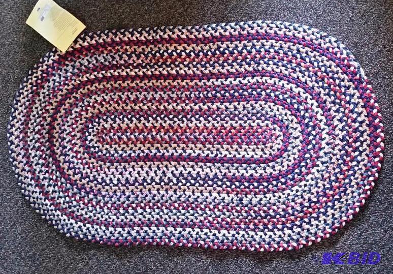 Large Braided Rug. Blues,  Reds, Multi-color.  27 x 48  Still has tags.